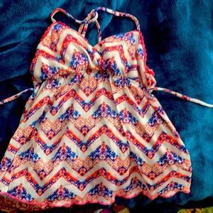 Shirt mostly pink but has other colors